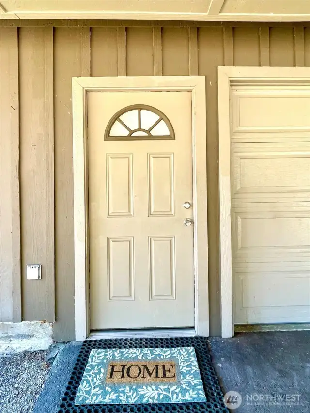Carport entrance into garage.
