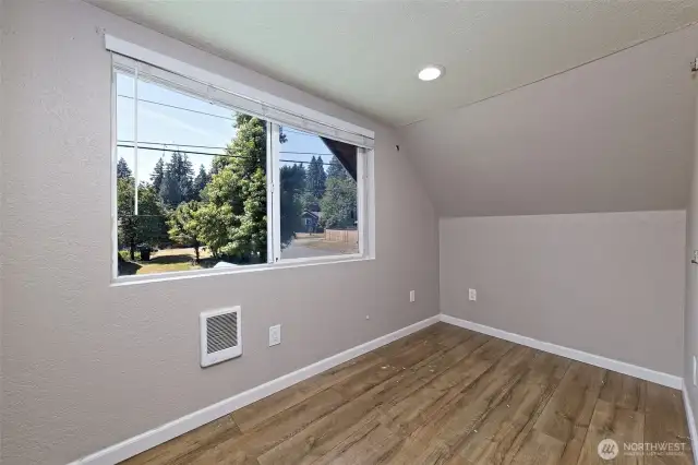 This is a small room adjacent to the updated bathroom that this seller used as the Primary closet area. Used for dressing space, clothes dressers, etc. Could also be a little sitting room or office?