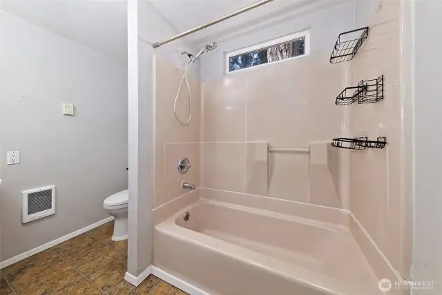 The mid-floor bathroom.
