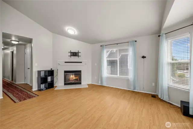 Light-filled living area with large windows.