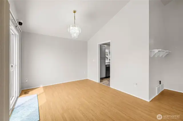 Open floor plan seamlessly connects living and dining areas.