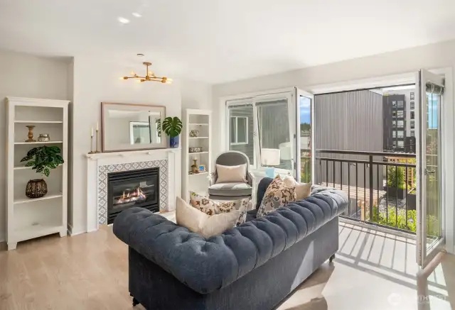 Full wall of west-facing windows, and cozy gas fireplace!
