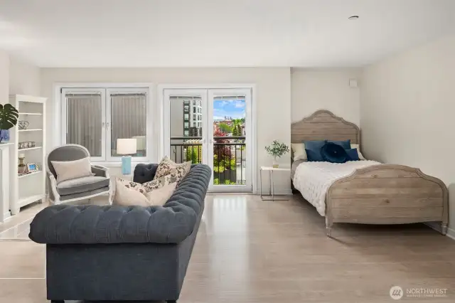 Great space for seating, yet also space for a bed and a dining room table.