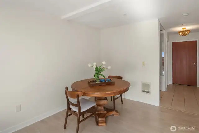 Dining room space - as you walk down the hall the first room on the left is the office nook.  Bathroom is on the right hand side, while walk in closet is just beyond the office on the left.