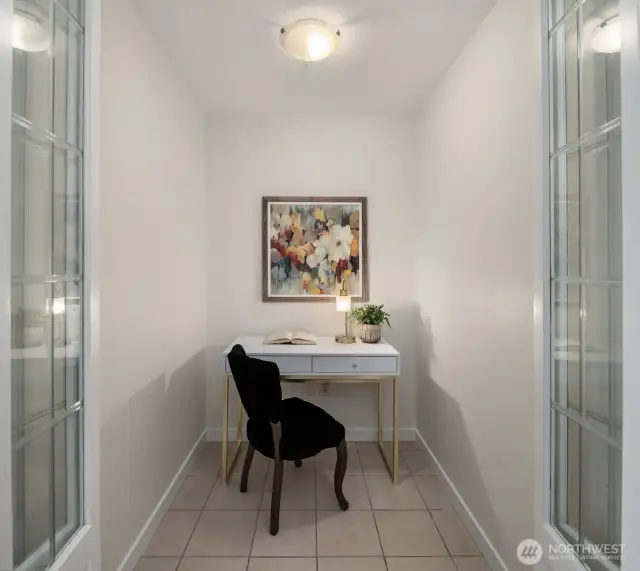 Office nook with folding glass doors offers a place for privacy.  Could also be a dressing room, or whatever else you need!
