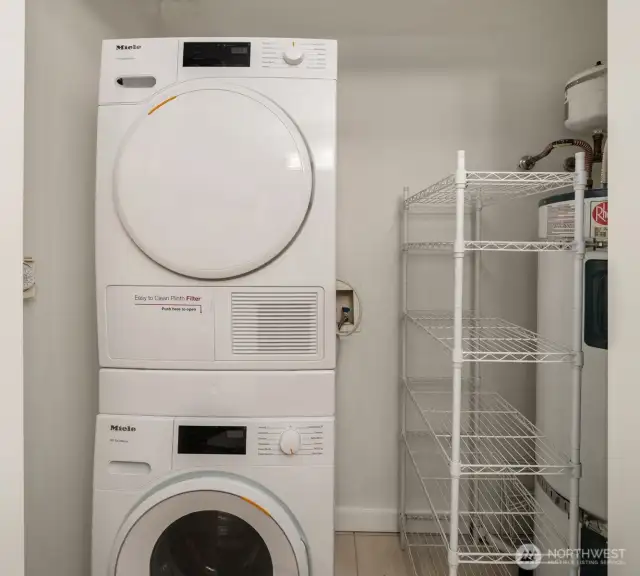 Miele washer and dryer in the bathroom.