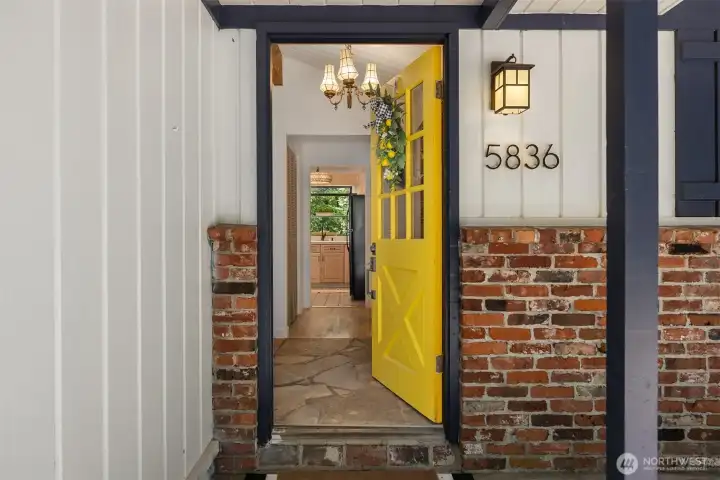 Step into your quaint island cottage perfectly situated up a private drive on a sunny lot.
