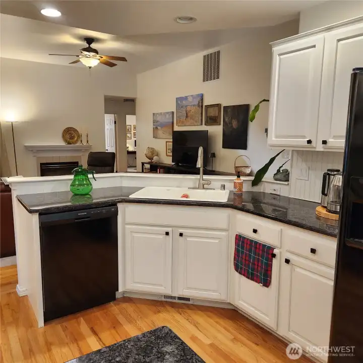 The kitchen has hardwood floors and like new appliances (stove is new)