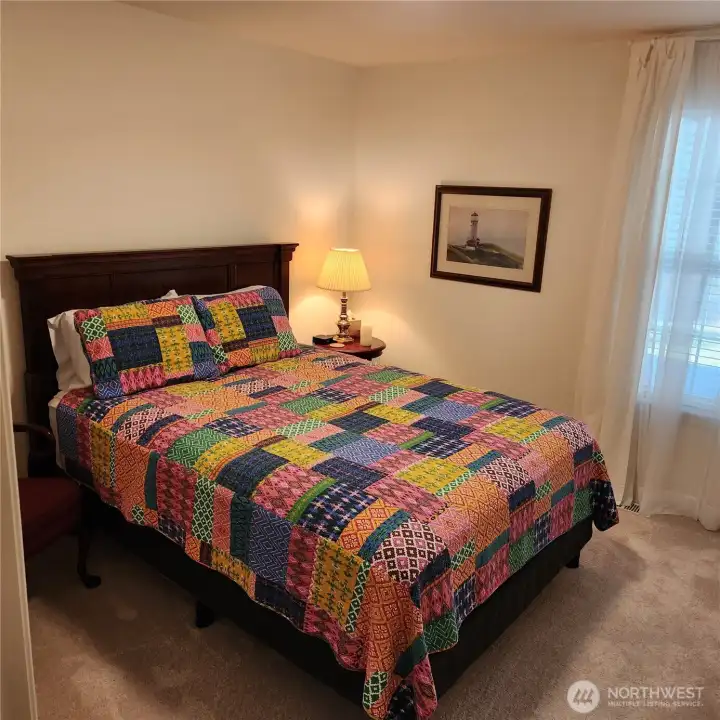 The second bedroom fits a queen size bed.