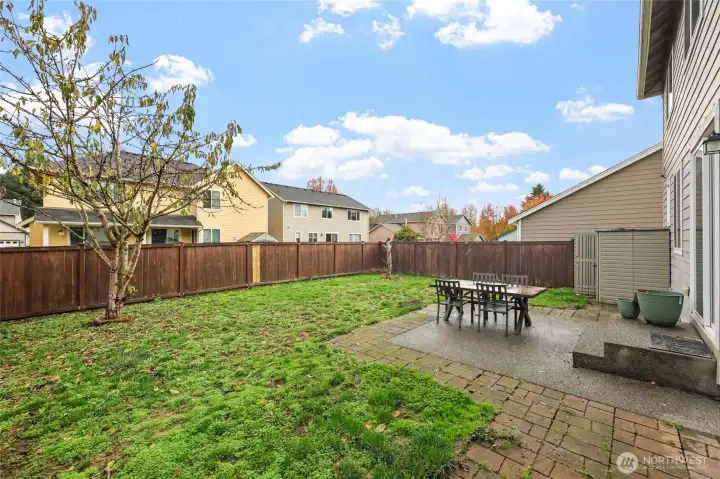 Fully fenced with gate on side.