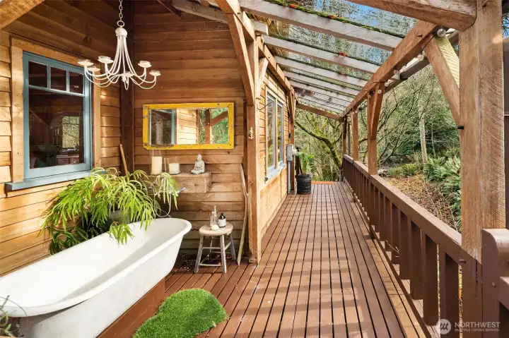 Outdoor tub on south deck. Sweet soaking spot!