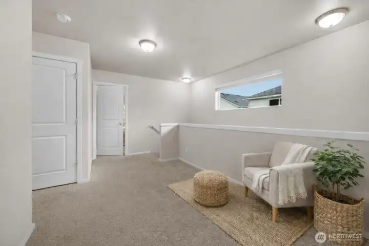 Look at the size of the upstairs landing area. Great sitting area for reading and relaxing.