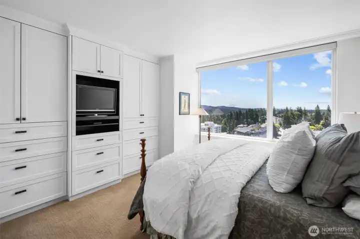 Oversized primary bedroom with natural light and 19th-floor views.