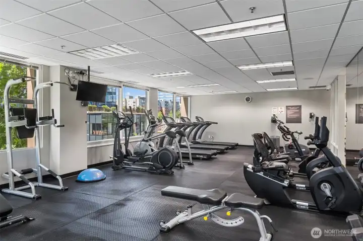 Fitness center with cardio and strength equipment.
