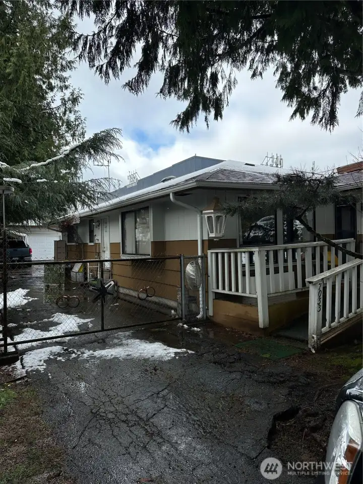 Ramp access, gated and fully fenced back yard.