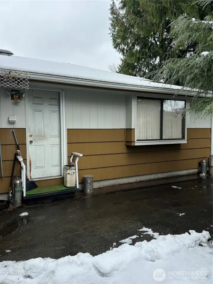 Side door, and living room window.