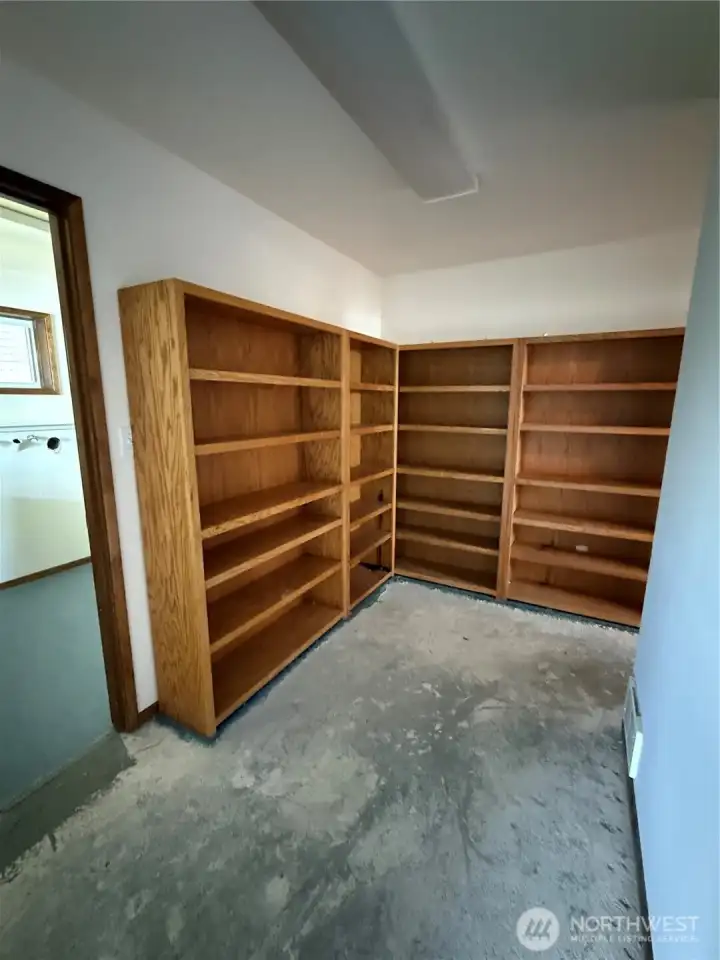Hallway with wood shelves