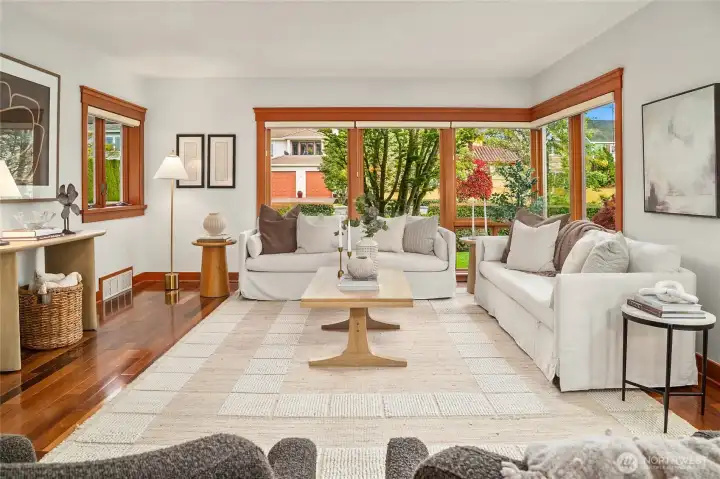 Stunning floor-to-ceiling windows surround the living room.