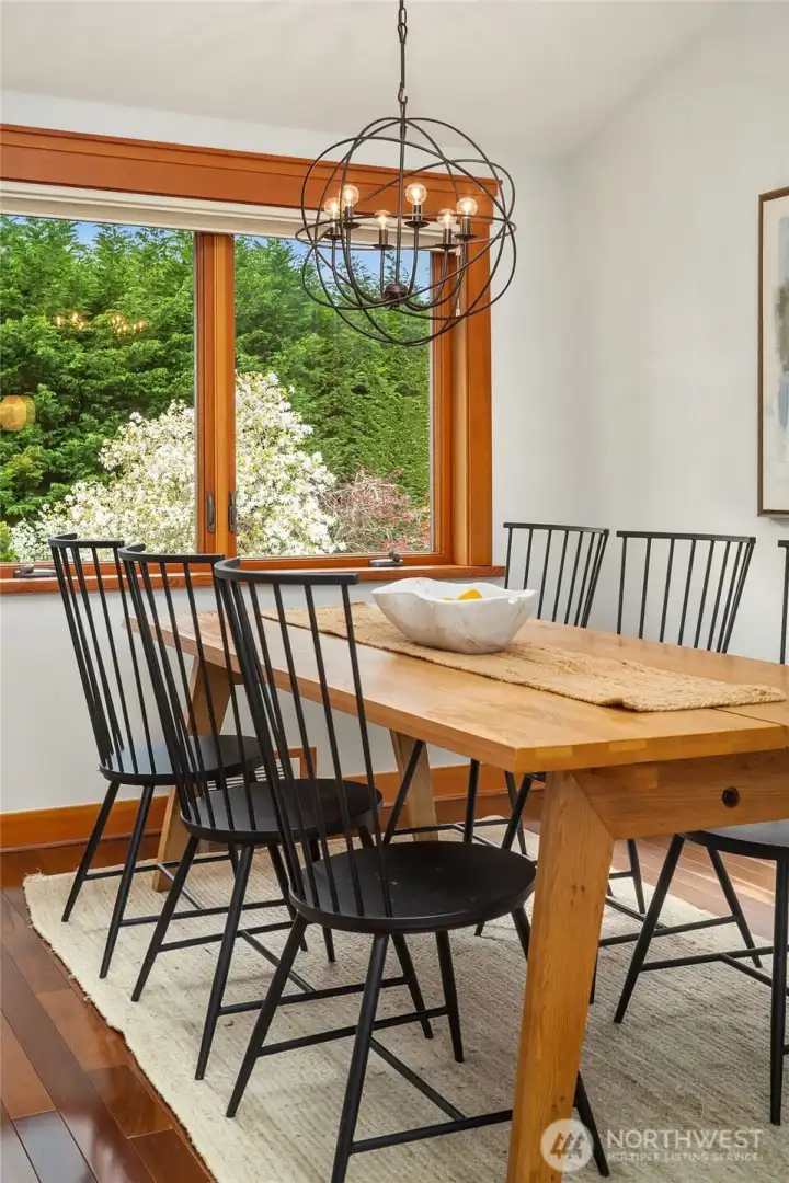 Informal dining overlooking backyard.