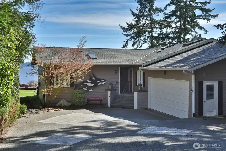 Light filled one level home home on N. Bluff with 180 degree views of the Cascade and Sound.