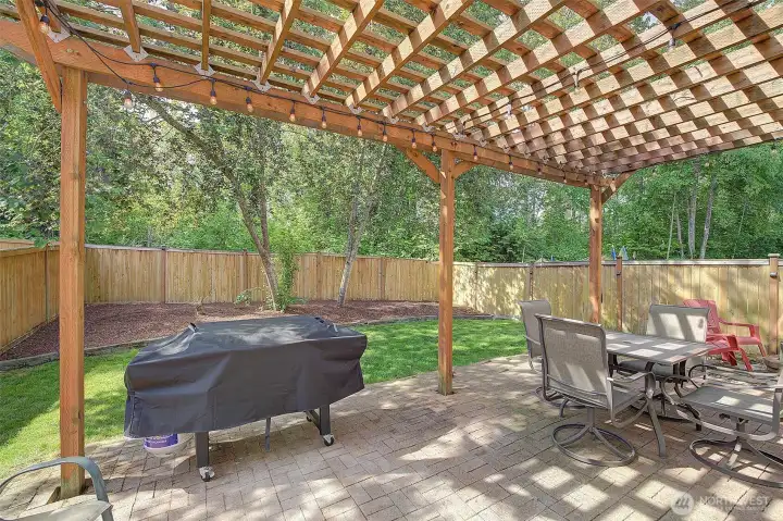 Custom Pergola in this lovely back yard oasis