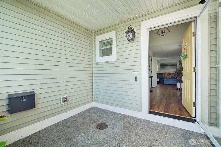 Front door entry is covered and spacious.
