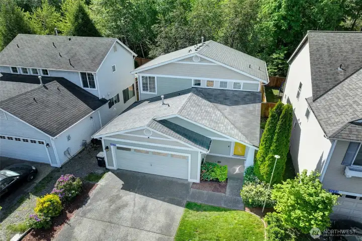 Plenty of parking in driveway and oversized 2 car attached garage