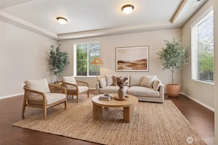 Expansive living room that is light and bright Expansive living room that is light and bright