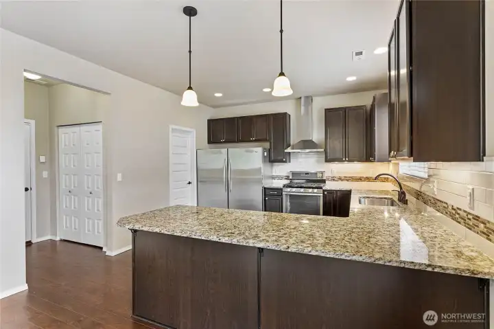 Pantry area extends the kitchen and allows for storage Pantry area extends the kitchen and allows for storage