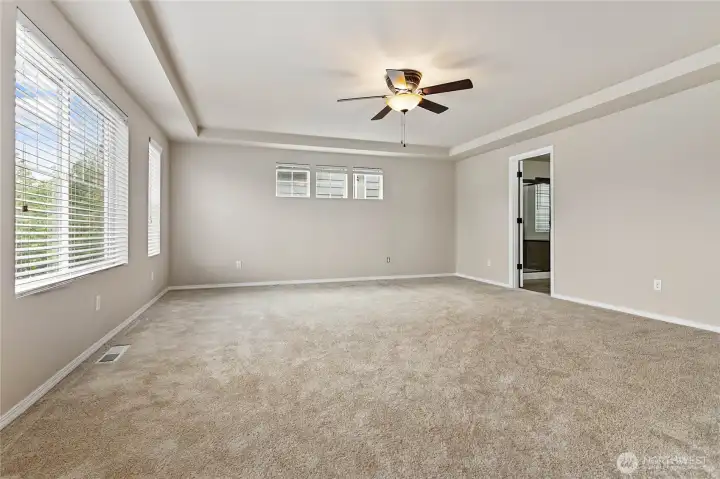 Enormous primary suite featuring a private en suite bath Enormous primary suite featuring a private en suite bath