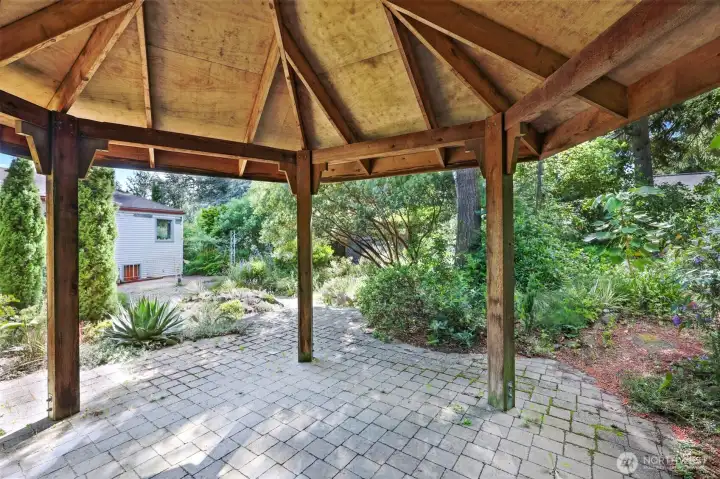 Gazebo situated in the middle of the garden Gazebo situated in the middle of the garden