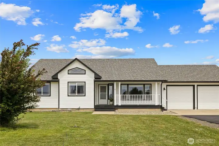 Nice green grass on 5 acres, this is such a charming setting.