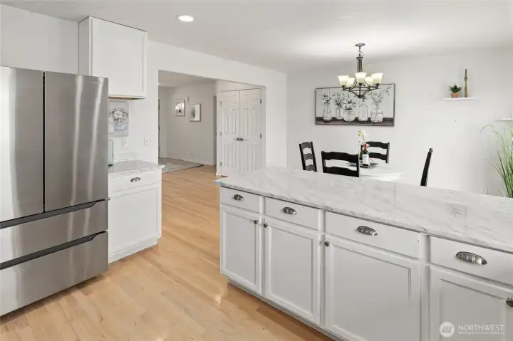Kitchen has stainless steel appliances and upgraded counters.