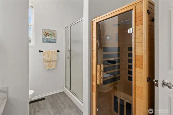 In the primary bedroom take a relaxing sauna to relieve the stress of the day.
