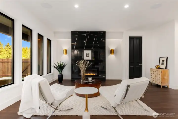 Open light living room with propane fireplace. Open light living room with propane fireplace.