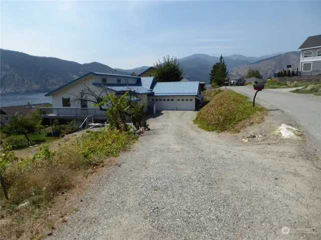 Driveway is yours but there is an easement for the neighbor to the west.