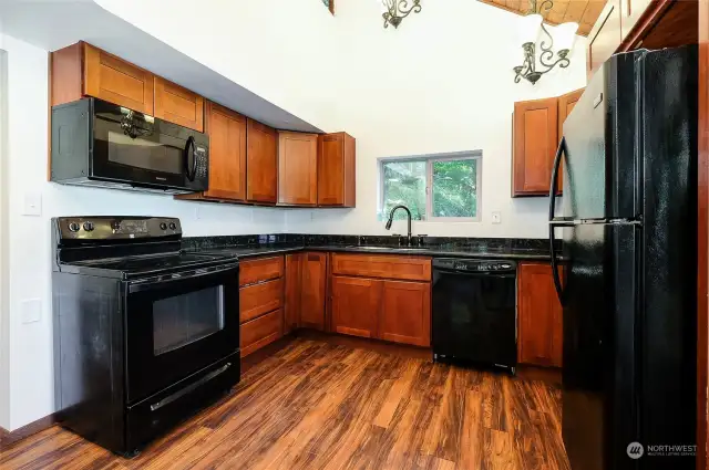 Kitchen has lots of storage.