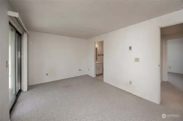 Bedroom 1 has slider to deck and door connecting to the upstairs full bath.