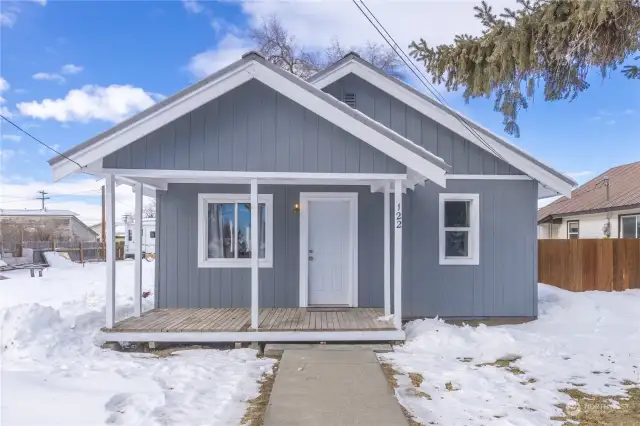 Covered front porch welcomes you!