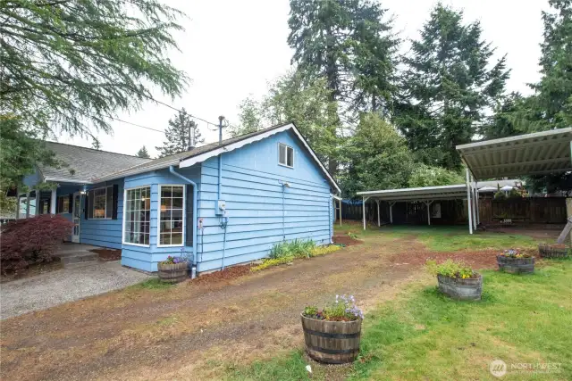 West side of home - Abundant Parking!