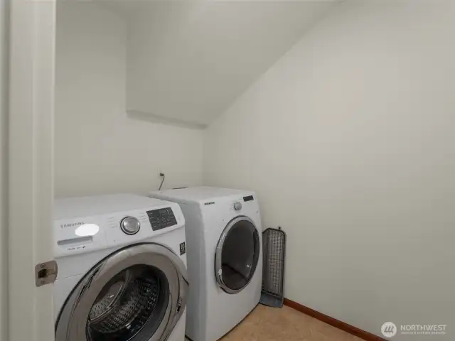 The laundry room is spacious and on the same level as the bedrooms!