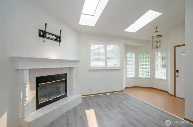 Skylights bring in natural light, making the home feel even brighter and more spacious.