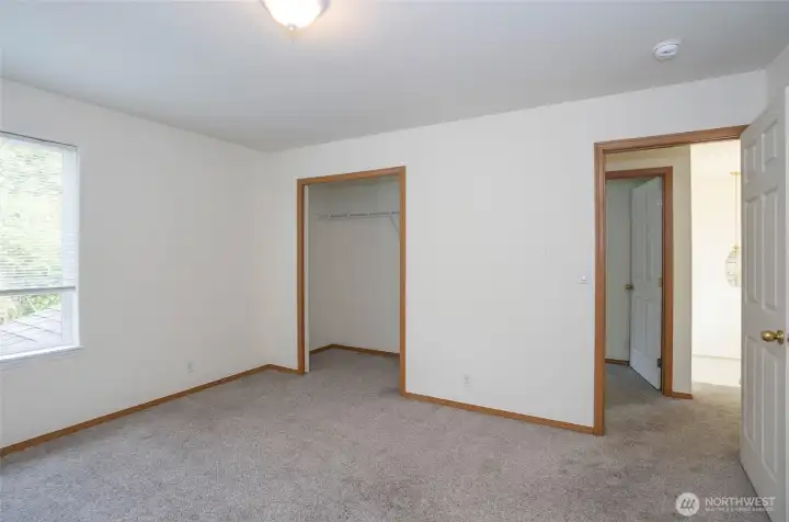 Upper level Guest suite #2 upstairs shown from another angle, featuring a spacious closet.