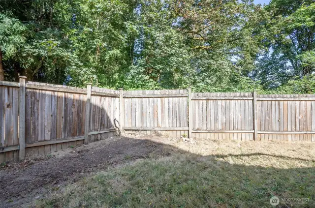 Enjoy added seclusion with greenbelt beyond backyard fence.