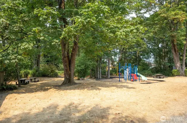 Adjacent to the clubhouse, the park features play structures and picnic tables—perfect for family enjoyment.