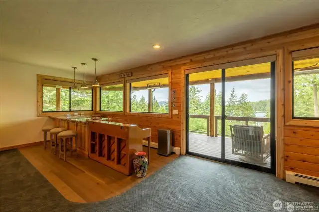 entertain like a pro with the bar and sliders to the lower level deck