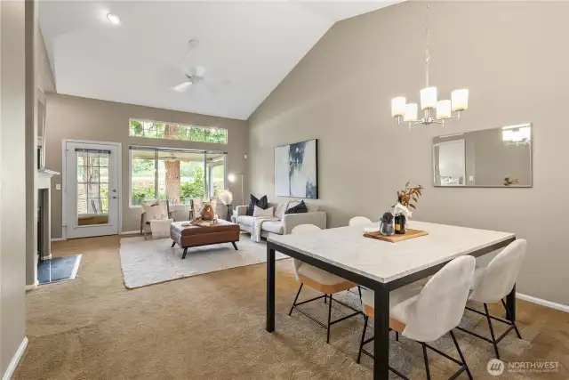 Vaulted ceilings and ceiling fans create an airy, comfortable living space.