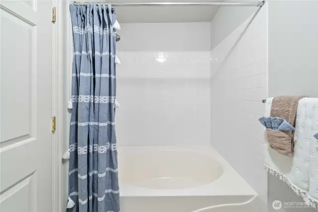 Versatile shower-tub combo perfect for relaxing baths or quick showers.