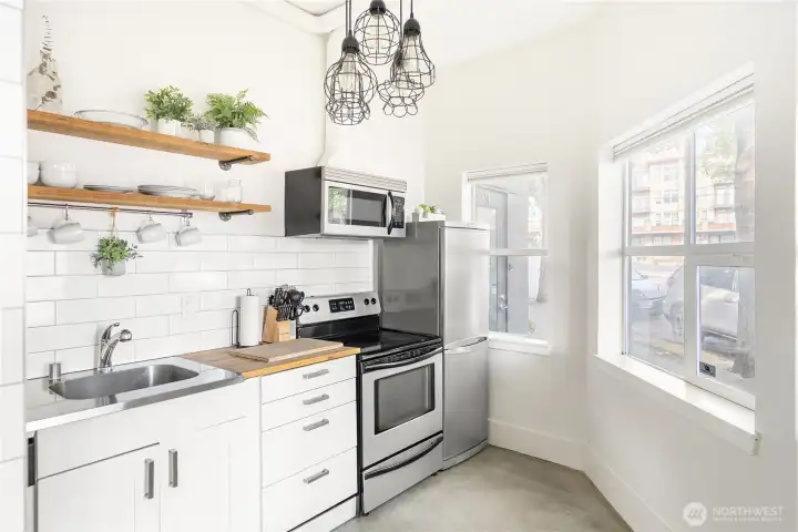 Ample window light makes this a great spot for many businesses, or a picture perfect vacation rental