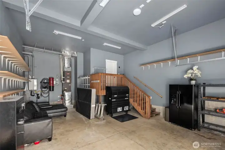 Spacious 2 car garage w/shelving